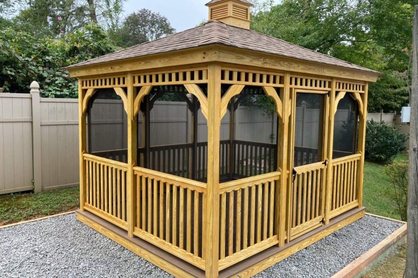 10x12 Wood Rectangle Gazebo on gravel pag in yard
