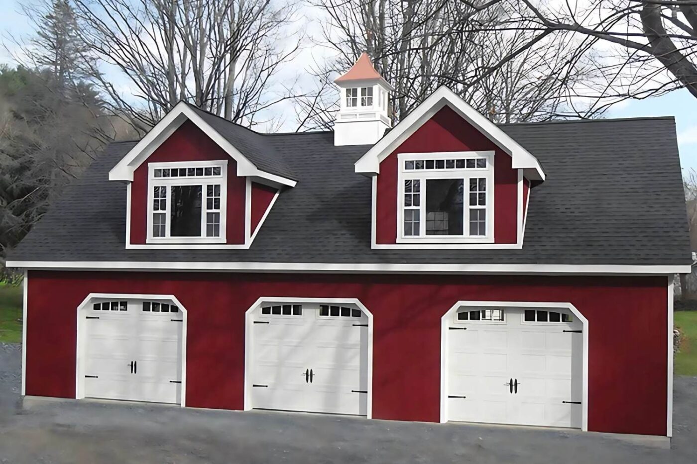 Doors and Windows 1 Red and white garage doors with white trim, white cupola and plentiful windows