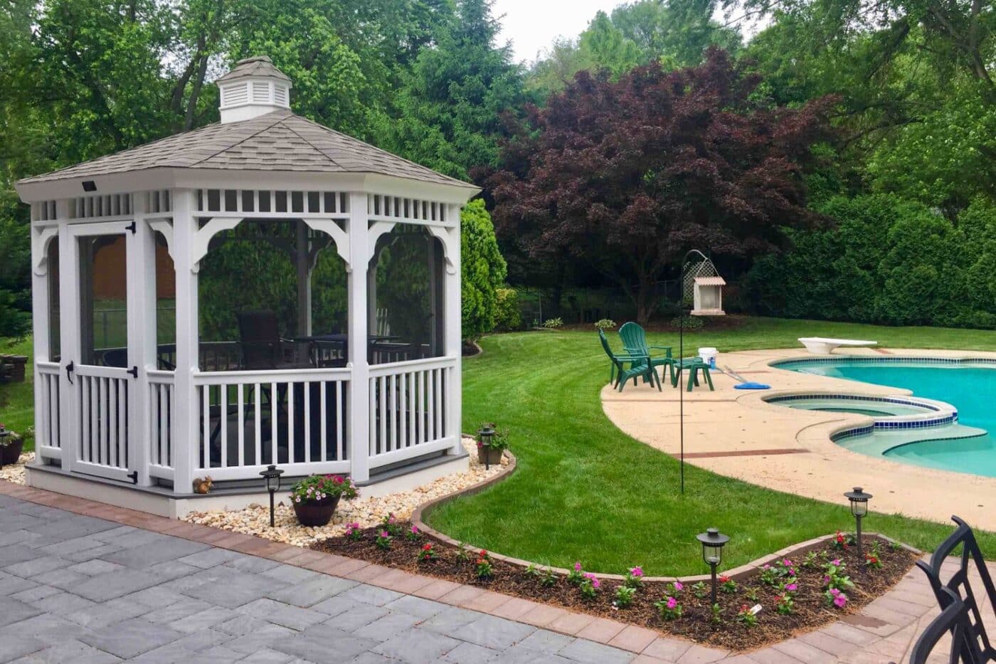 Roof Styles 2 Vinyl Gazebo besides pool with a standard roof