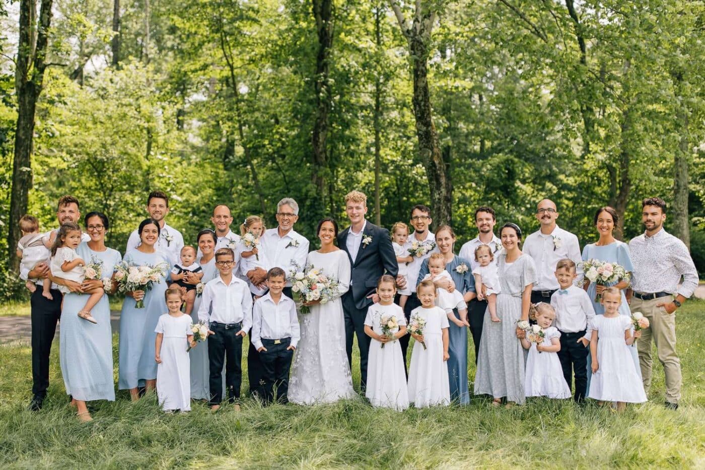 About Us 5 Ivan King surrounded by family and trees