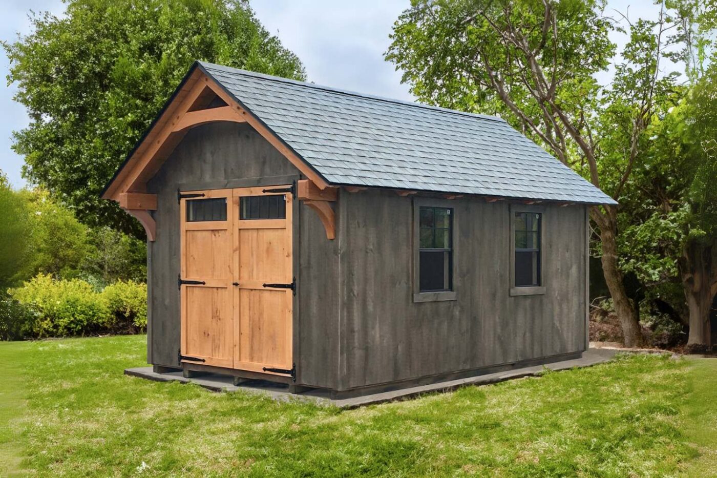 Gray and wooden Lancaster TF Shed in grassy area with double door and two windows
