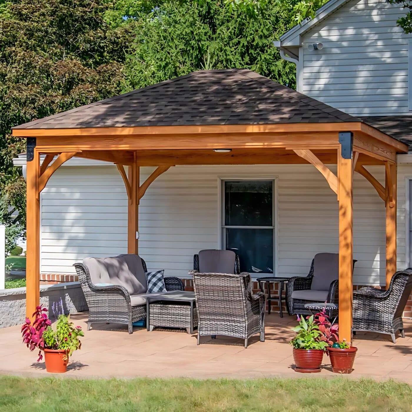 The Lakefront Pavilion 2 Lakefront wooden pavilion besides home with seating area underneath