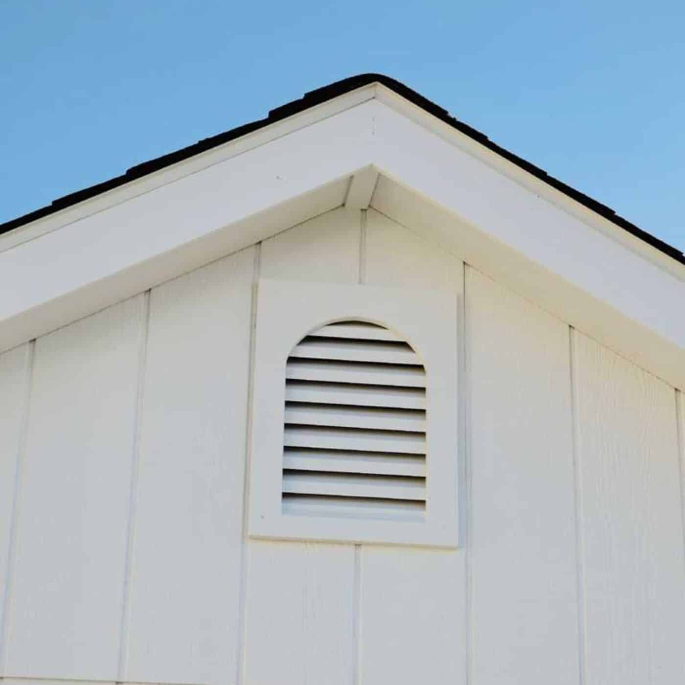 Vent on carriage shed next to blue sky