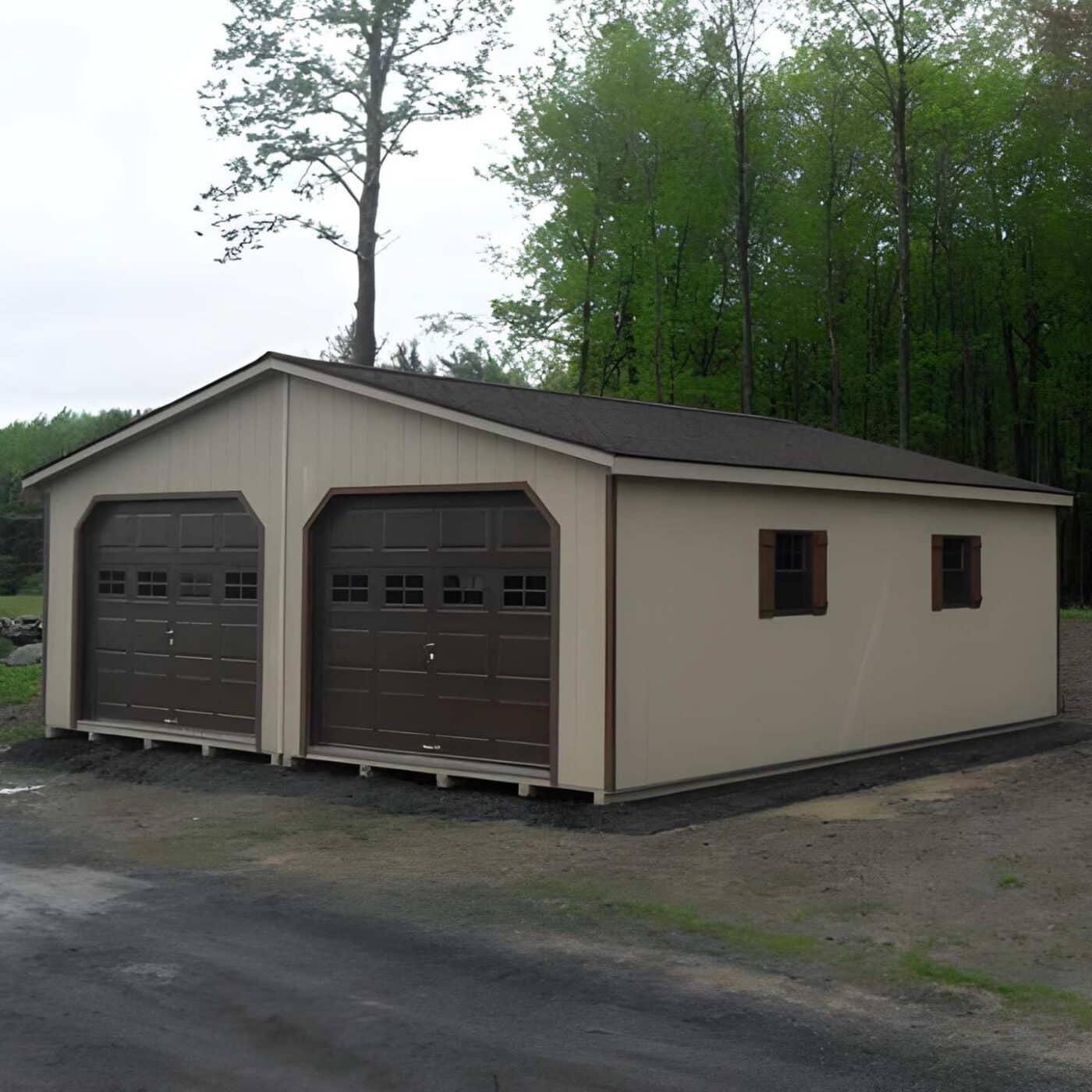 The Modular Garage 3 Brown and beige garage made from standard materials on dirt path besides trees