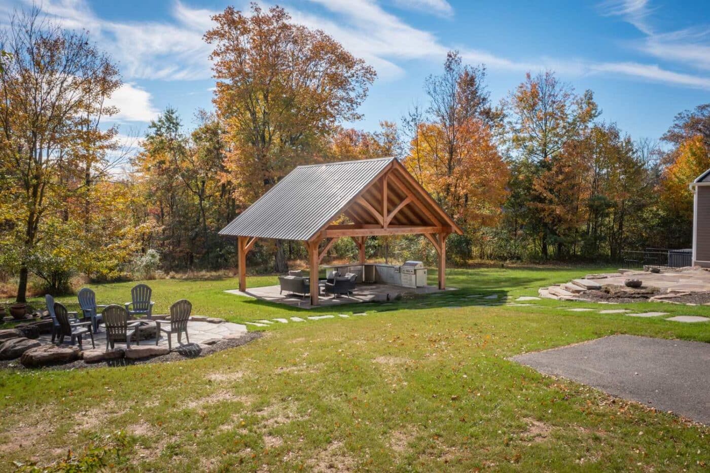 About Us 1 The Kingston Pro Timber Frame Pavilion in backyard at distance