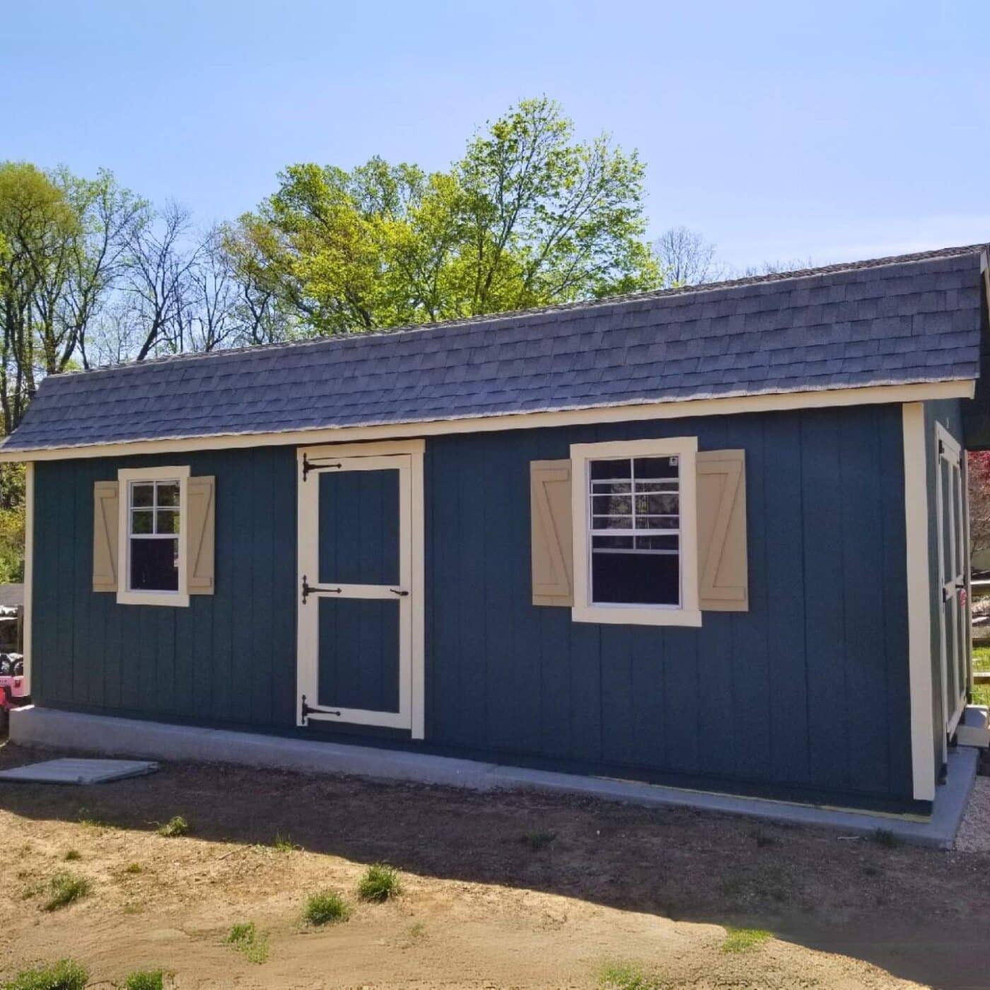 The Designer High Barn Shed 8 Designer High Barn shed with view of two windows and single door