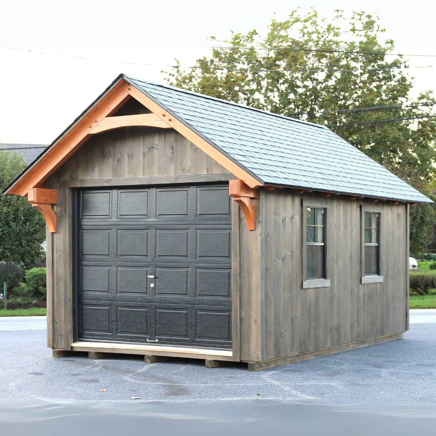 The York Shed 6 Garage door and two windows on York Timber Frame Shed with timber frame overhang